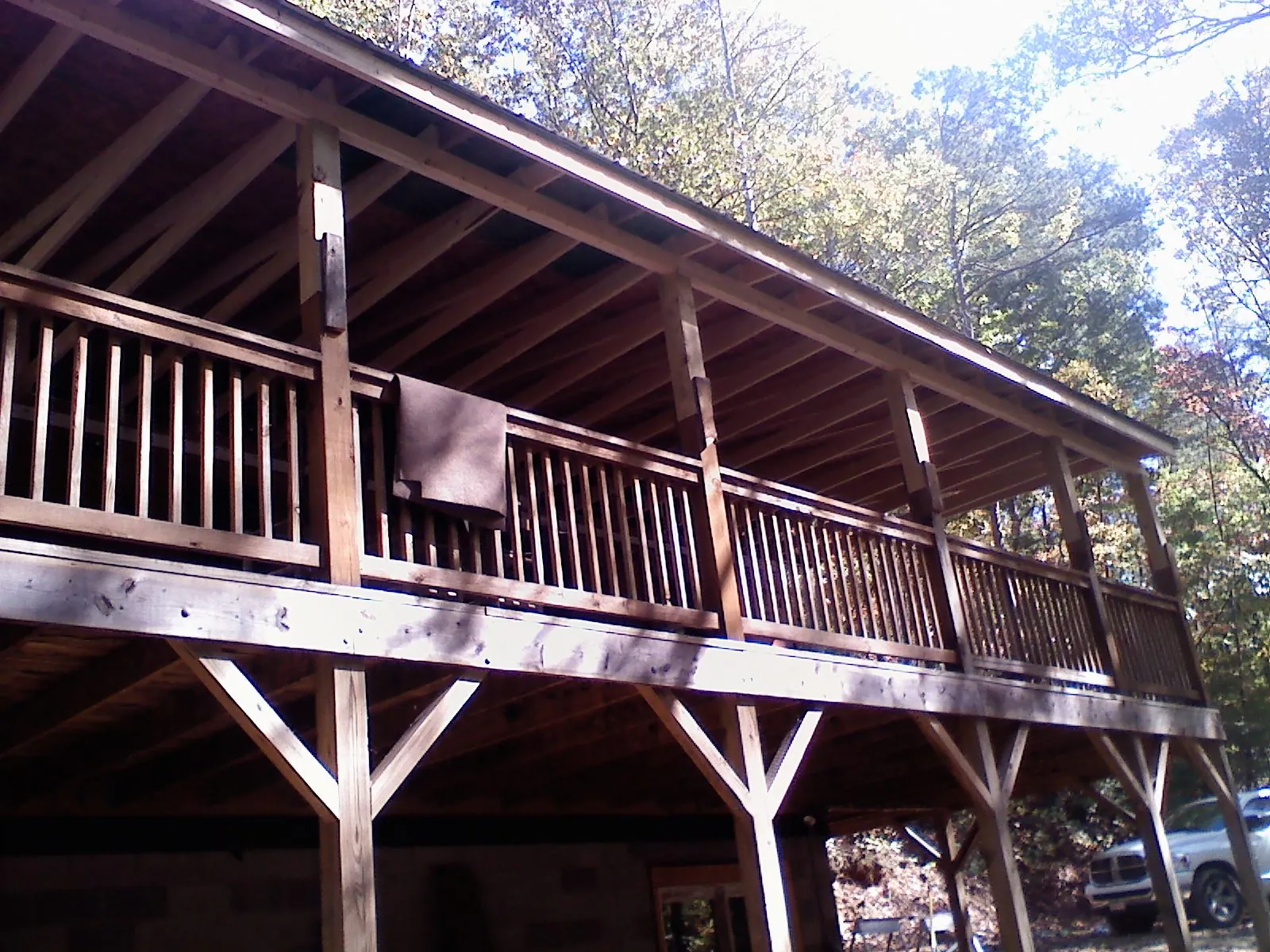 Timber framing under a new elevated porch and deck — Roof Leak Repair in Treynor by Roofing Brothers